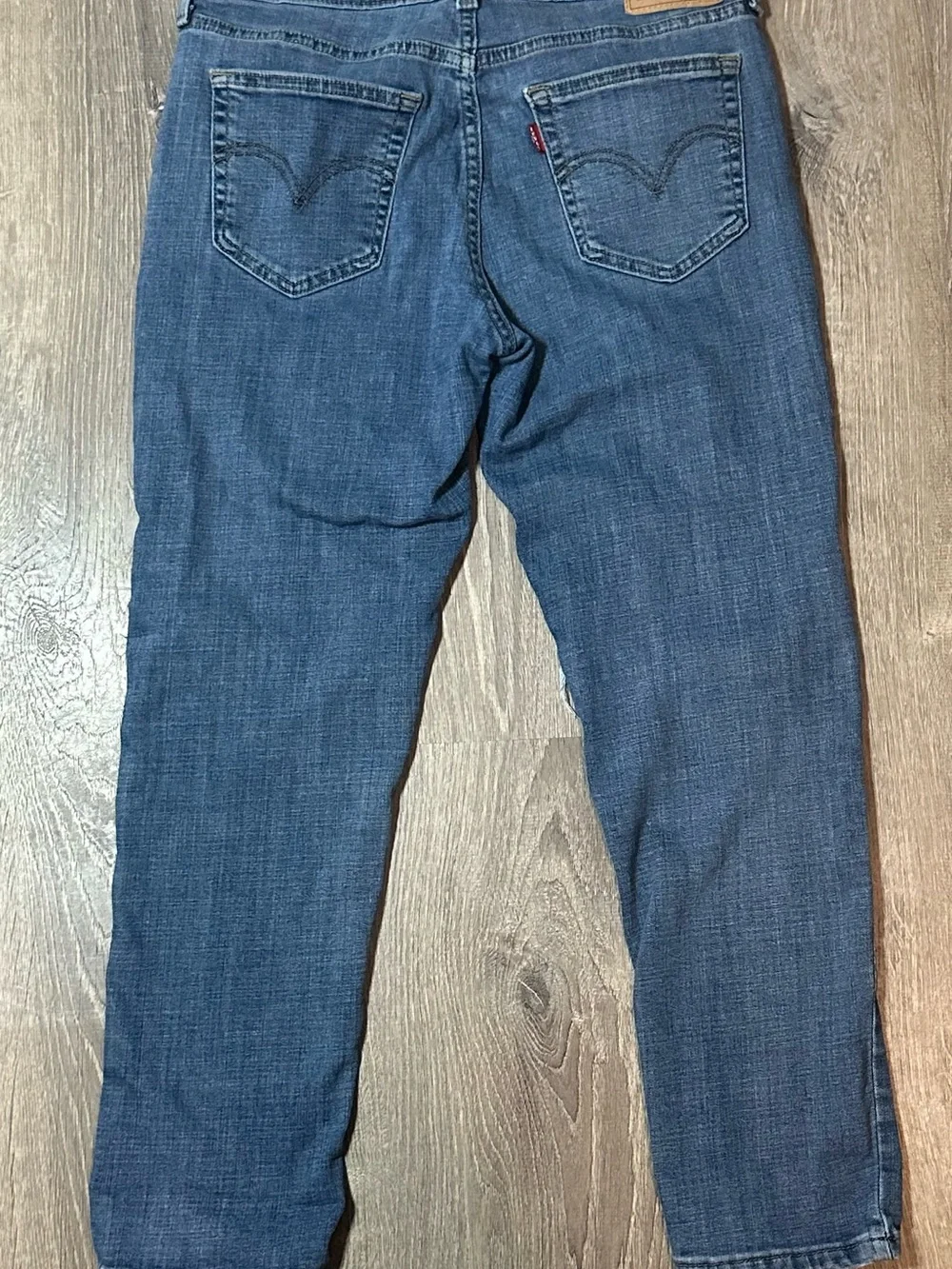 Levi’s women's Distressed Skinny Jeans in Dark Blue Wash